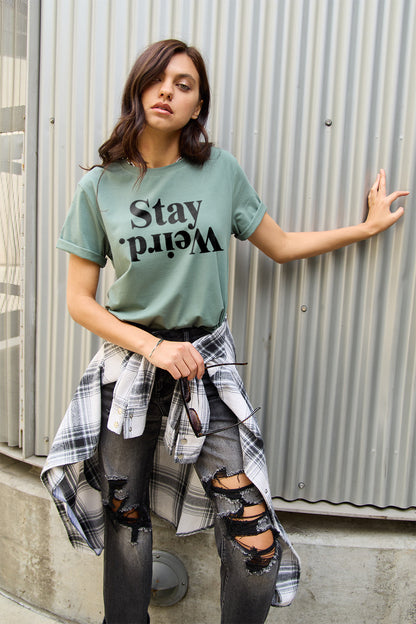 Stella "Stay Weird" Graphic Tee